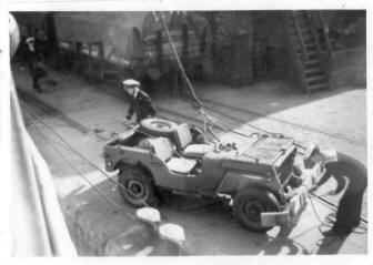 HMS Sharpshooter - unloading the jeep at Grimsby