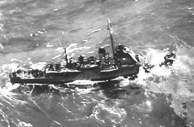 HMS Sphinx damaged by bomb - Halcyon Class Minesweeper